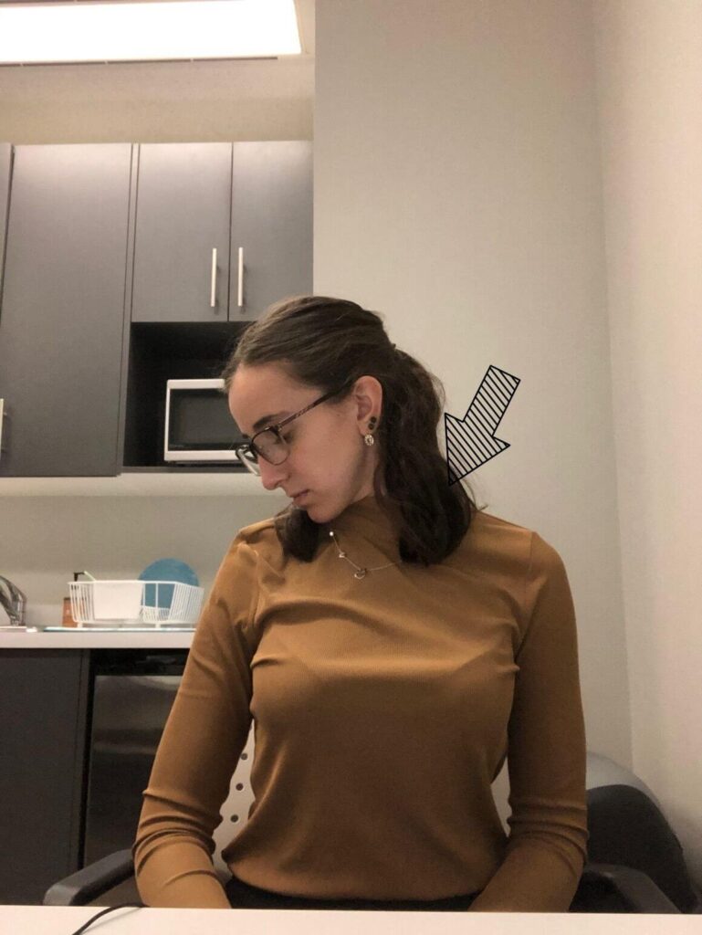 Side neck stretch, ear to shoulder with chin pointing down