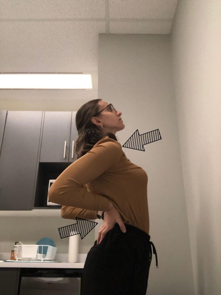 Standing stretch with palms on low back